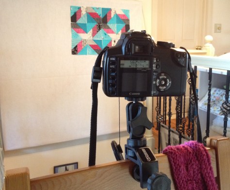 Tripod clamped to the back of a chair. This picture was obviously taken with my phone!