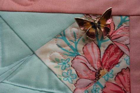 butterfly pins on garden quilt