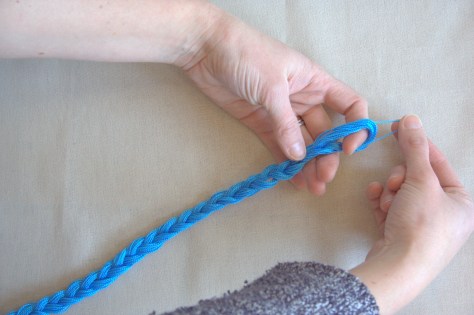 removing strand of floss from braid