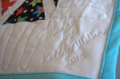 quilt label free motion quilted