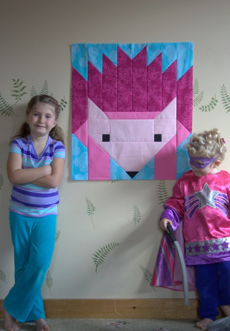giant pink hazel hedgehog and kids for scale