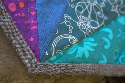 alison glass prismatic medallion roygbiv mini quilt finish