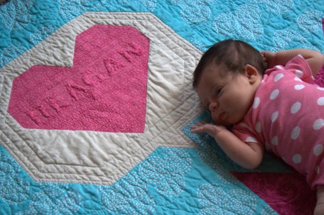 reagan on her hazel hedgehog quilt