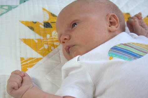 baby on quilt