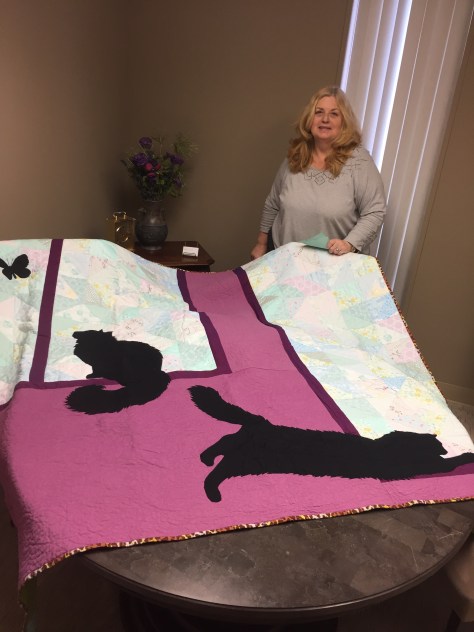 J with her quilt happy recipient