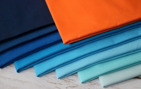 kona cotton ocean gradient with orange