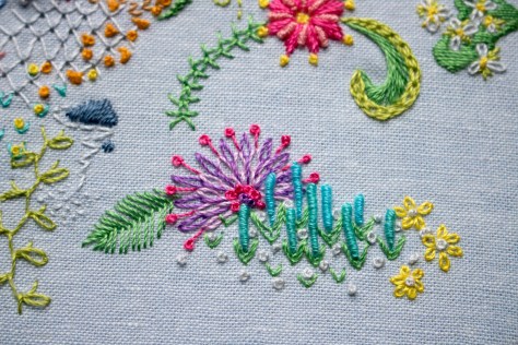 march 1 year of stitches progress flower