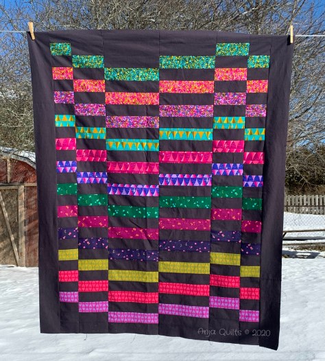 anja clyke staggered alison glass dark background quilt